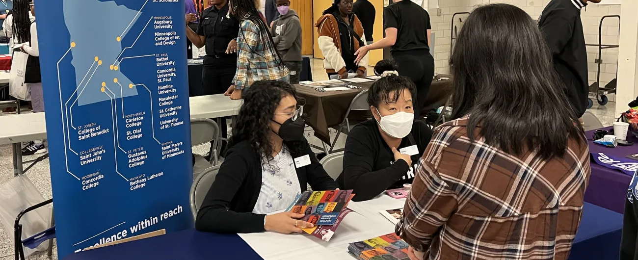 Career represents talk with students at career fair