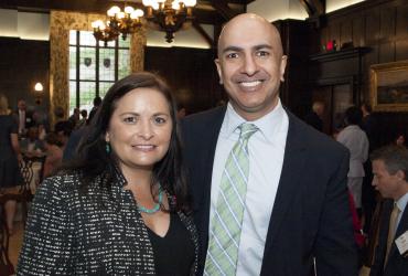 Achieve CEO Danielle Grant standing with Federal Reserve president Neal Kashkari